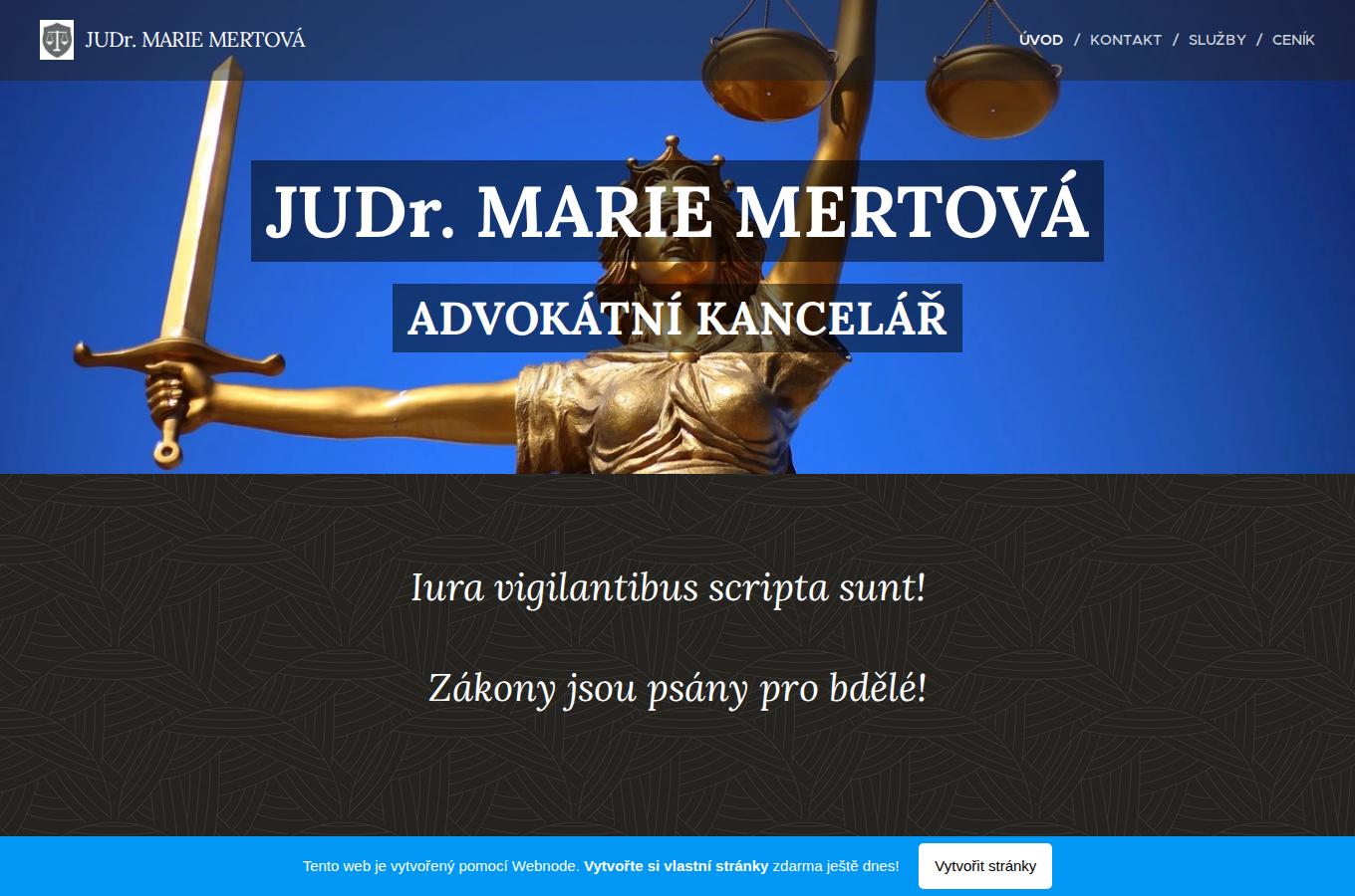Současný web JUDr. Marie Mertová advokátní kancelář na počítači
